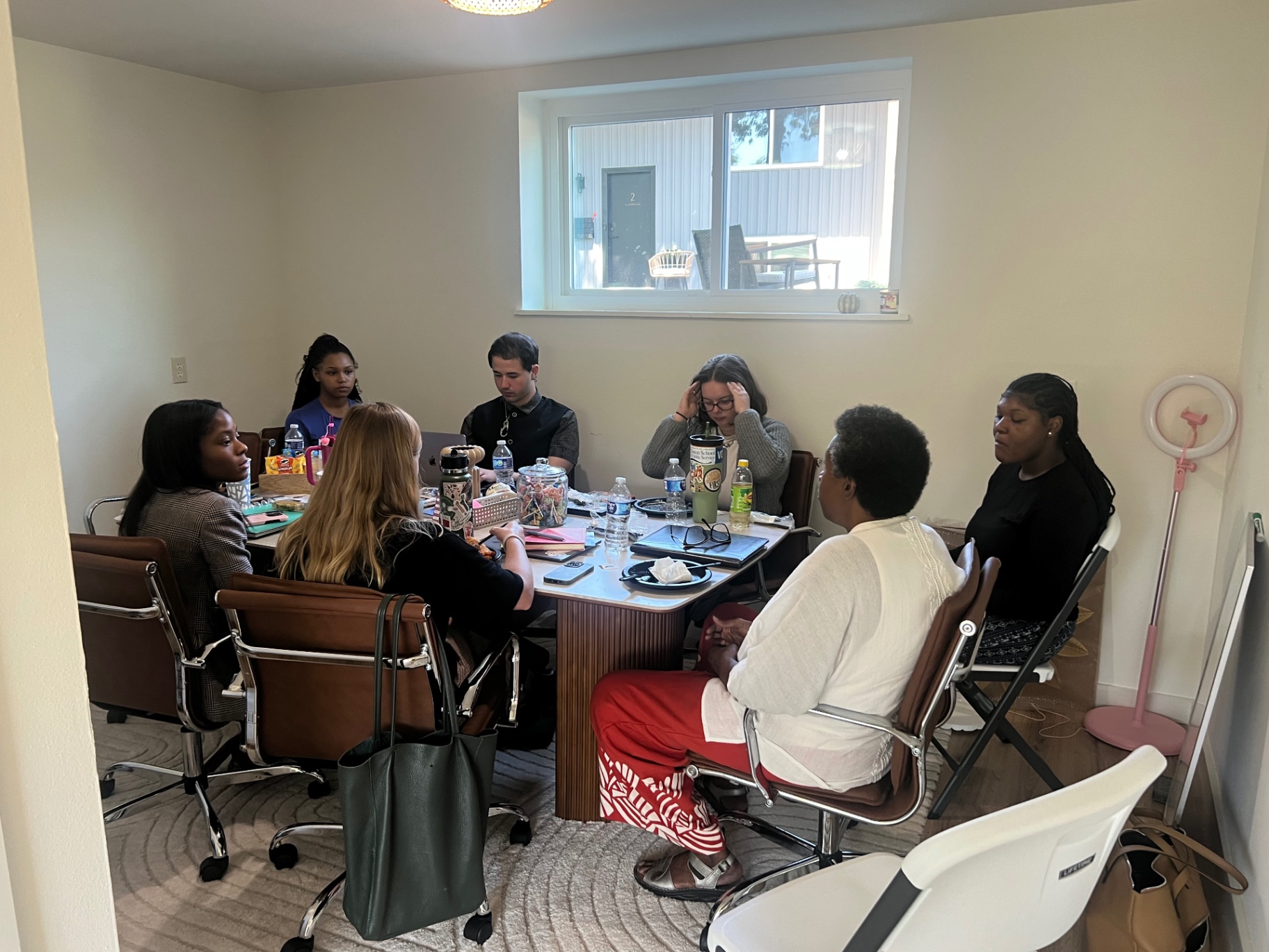 Village Public Health team planning session around the table